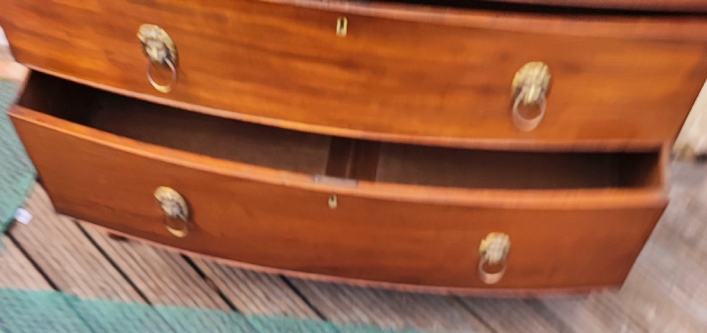 Regency bow front mahogany chest of drawers. View II