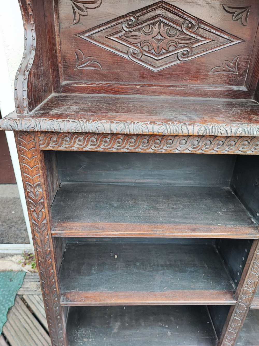Antique carved oak open bookcase. View VI
