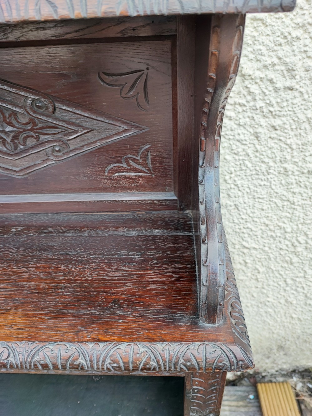 Antique carved oak open bookcase. View X