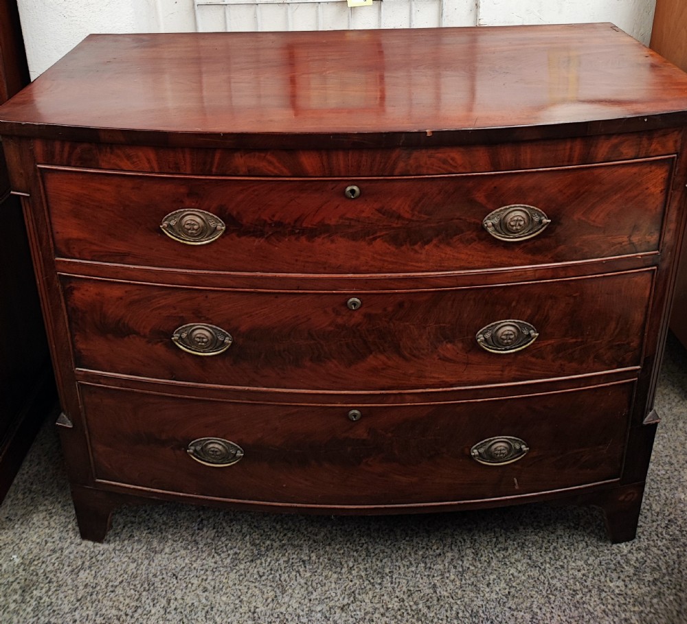 Antique mahogany bow front chest of drawers.