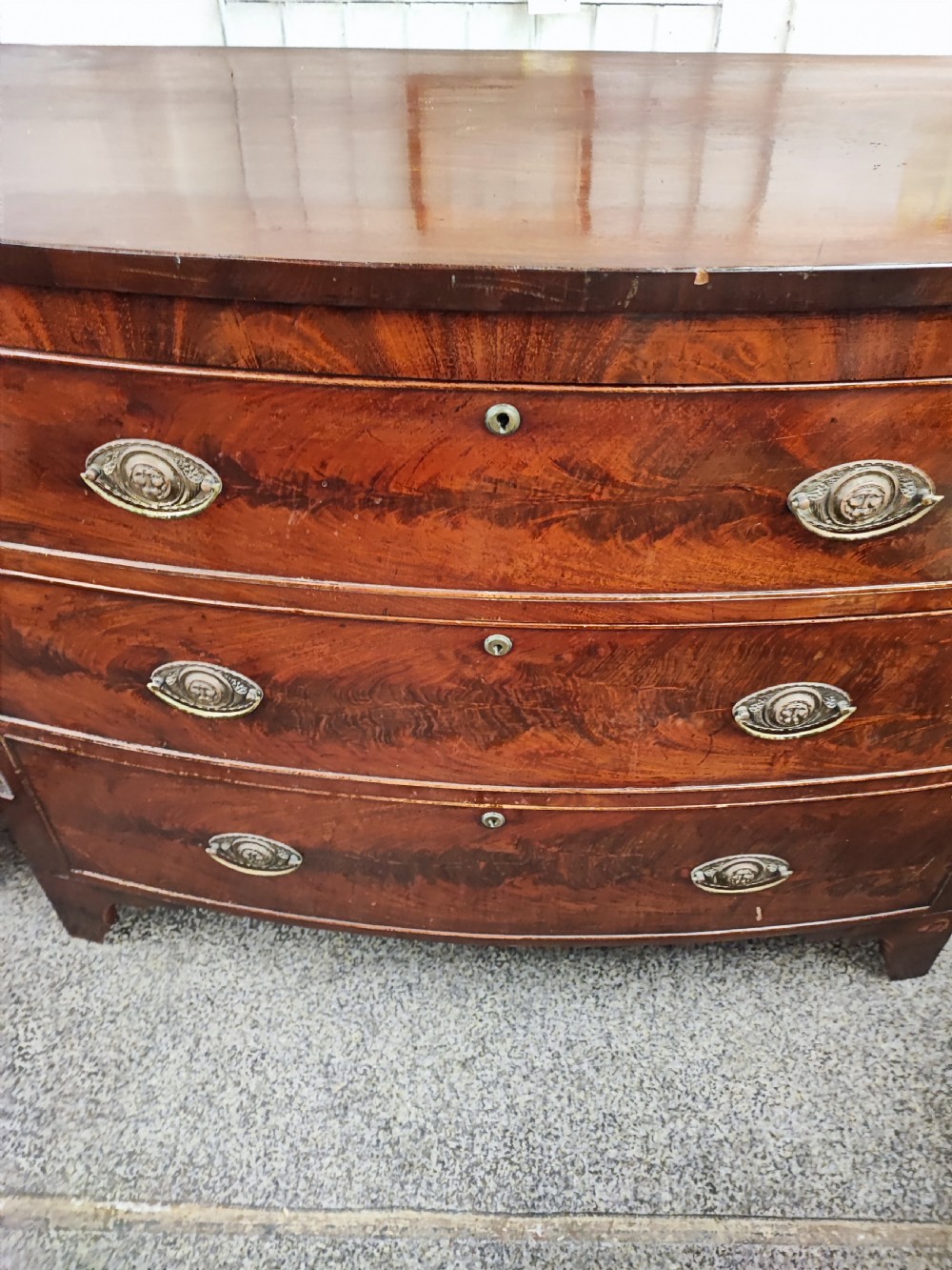 Antique mahogany bow front chest of drawers. View III