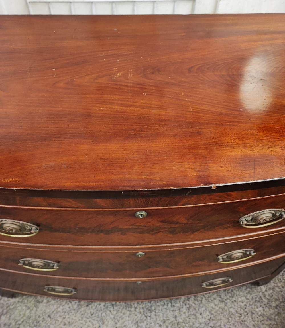 Antique mahogany bow front chest of drawers. View IV