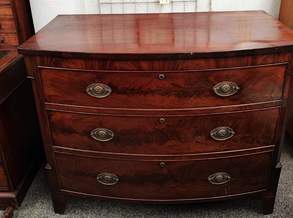 Antique mahogany bow front chest of drawers. View VII