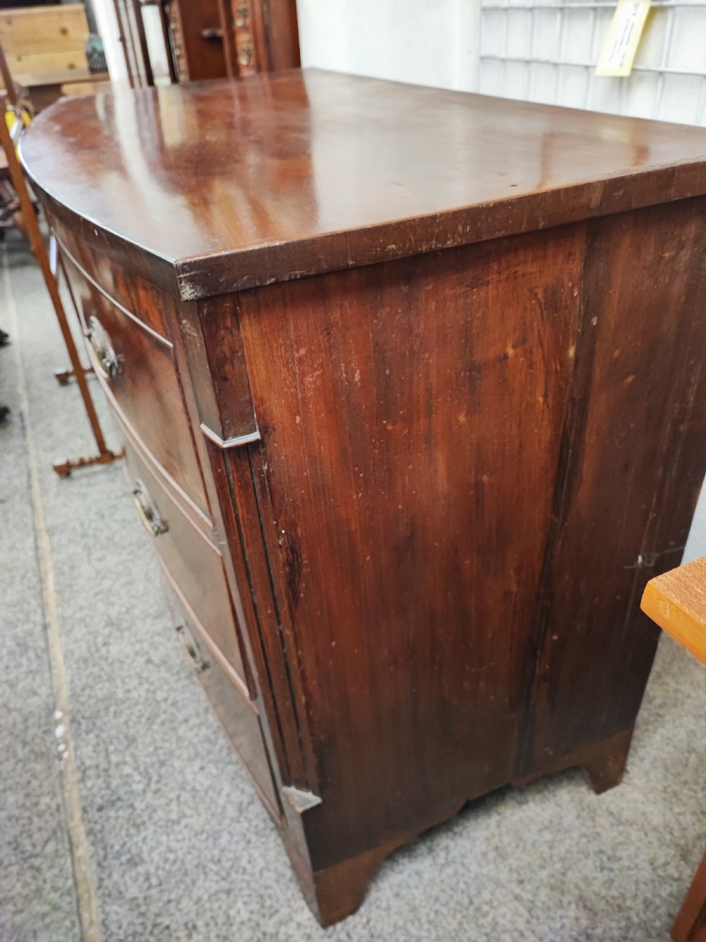 Antique mahogany bow front chest of drawers. View VIII