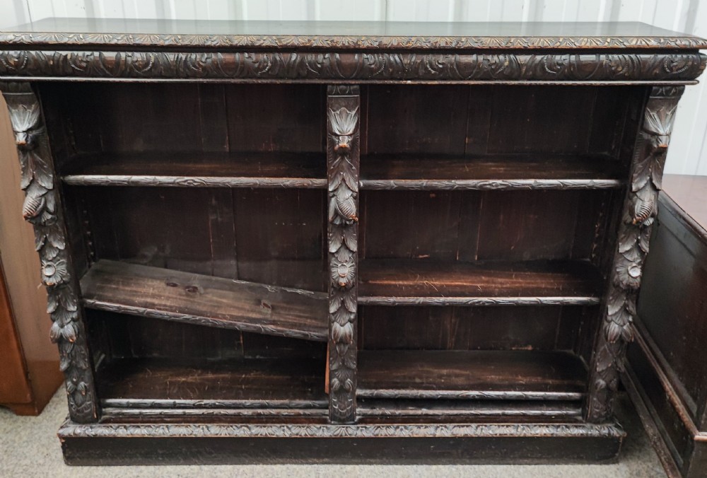 Victorian carved oak open bookcase.