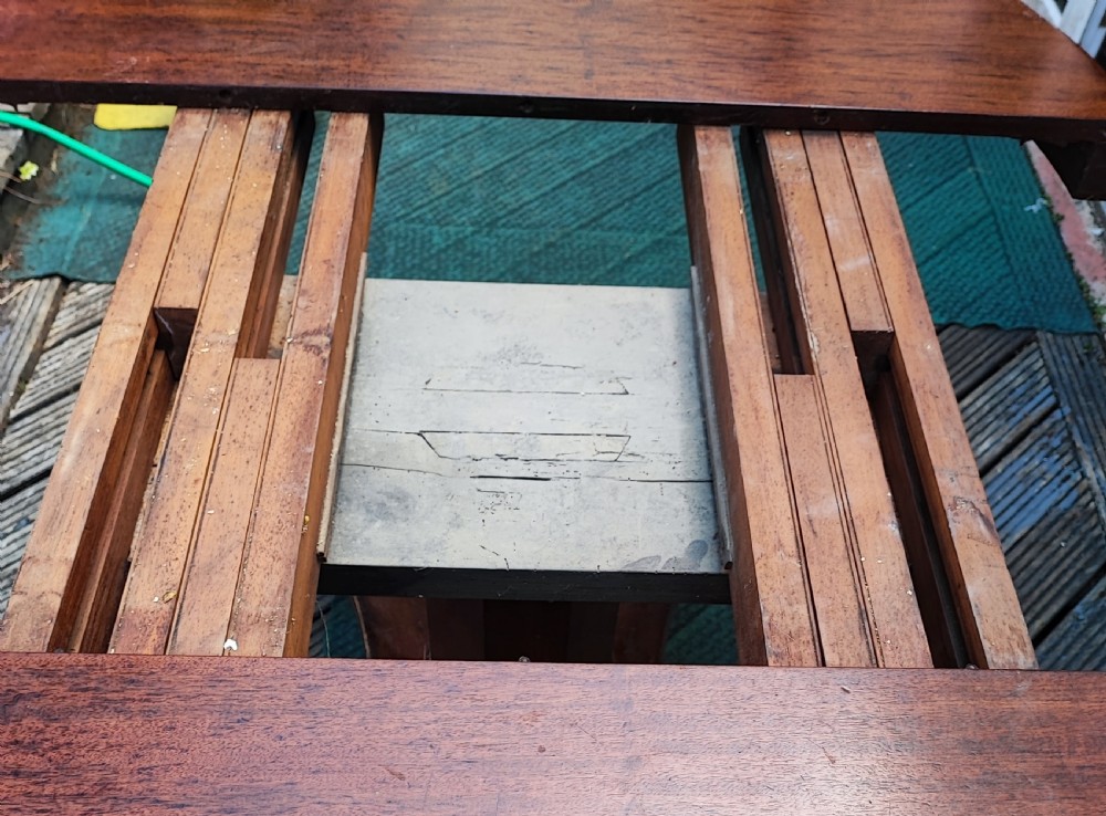 Antique mahogany circular extending dining table. View V