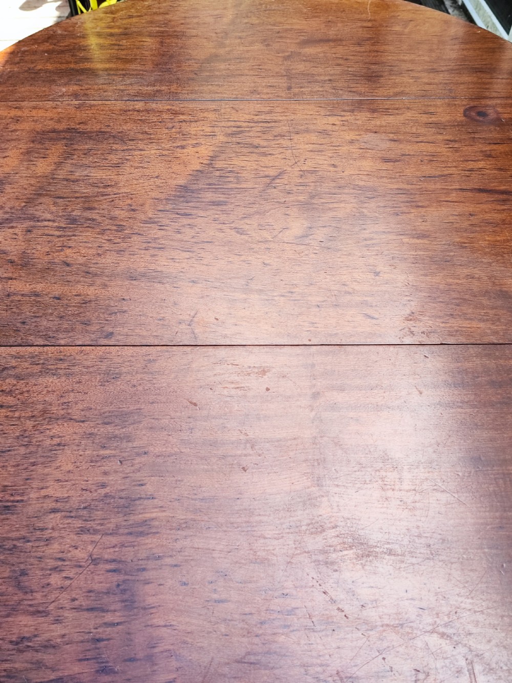 Antique mahogany circular extending dining table. View VIII