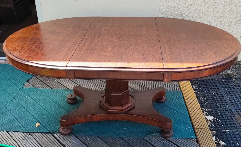 Antique mahogany circular extending dining table. View X