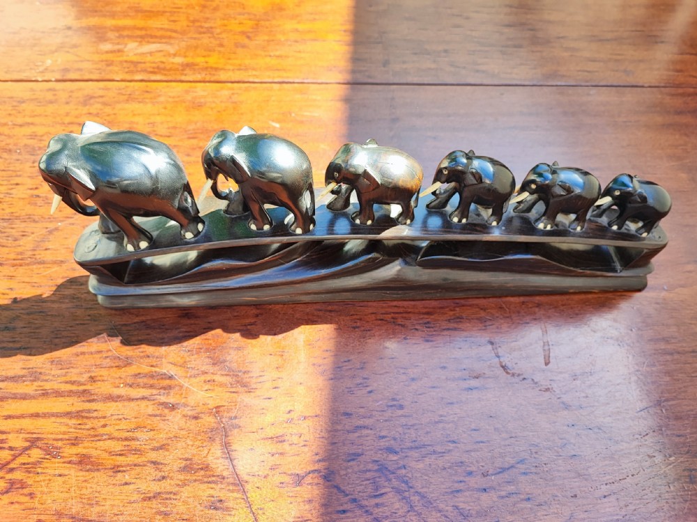 A bridge of 6 elephant's carved in ebony and bone 