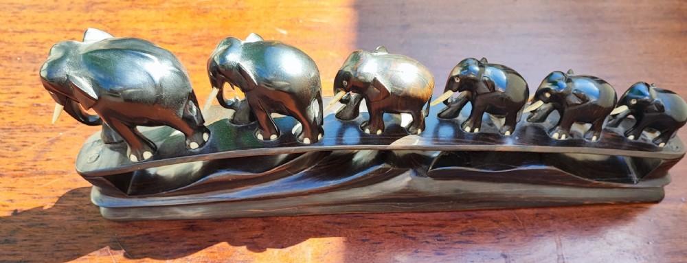 A bridge of 6 elephant's carved in ebony and bone  View II