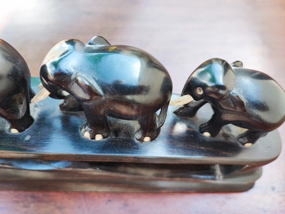 A bridge of 6 elephant's carved in ebony and bone  View III