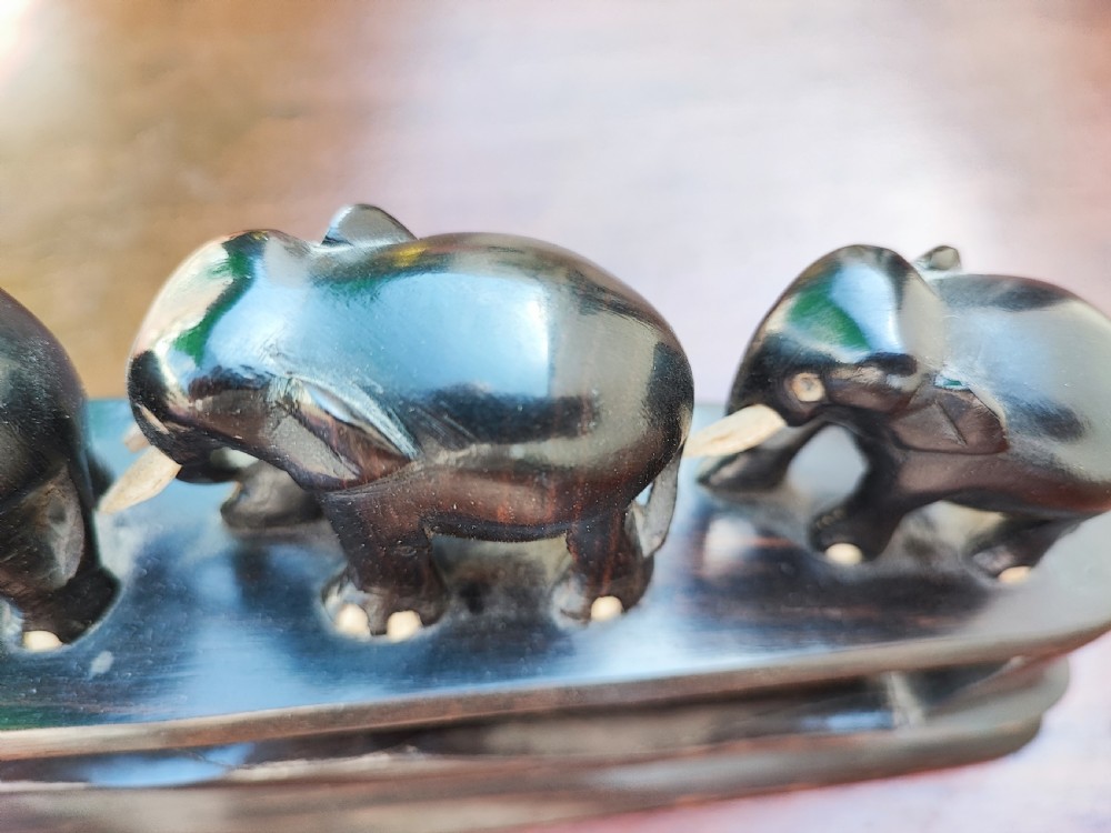 A bridge of 6 elephant's carved in ebony and bone  View V