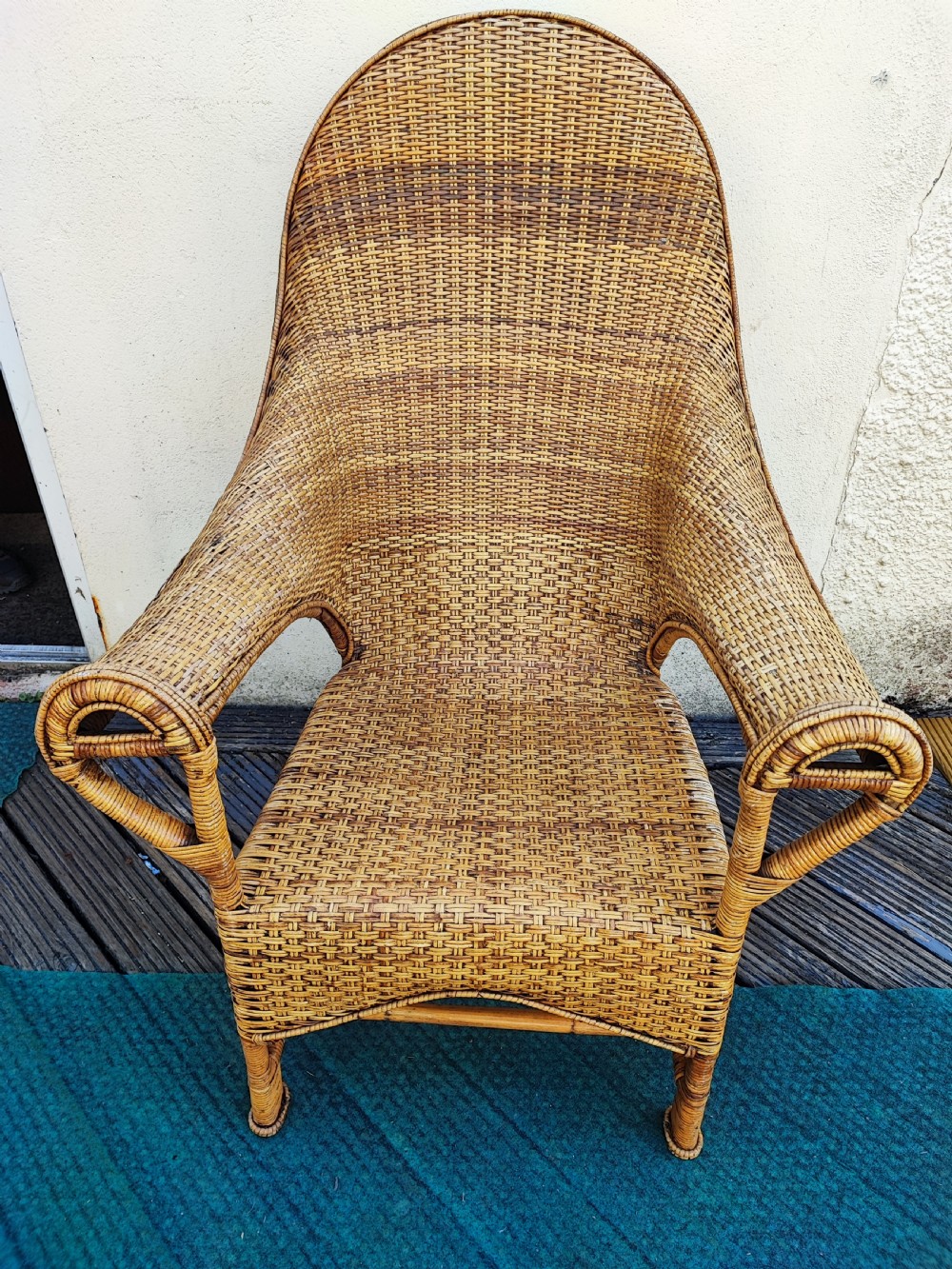A 1920s Dryad art's and crafts cane armchair.