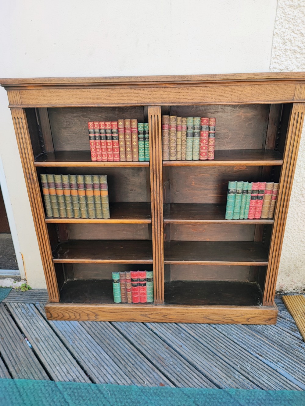 A fine Edwardian oak open bookcase.