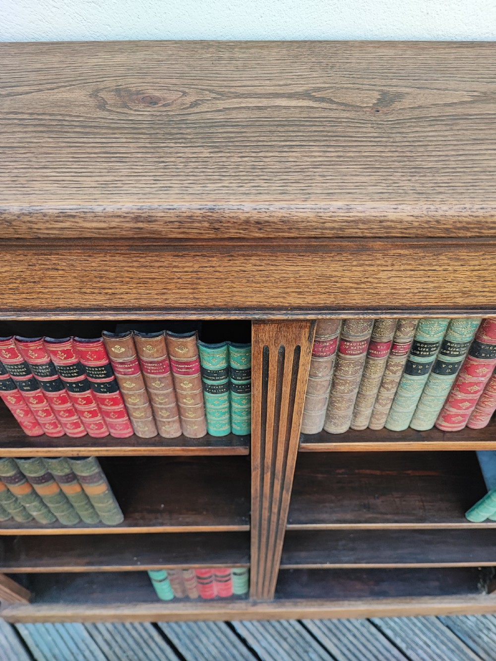 A fine Edwardian oak open bookcase. View III