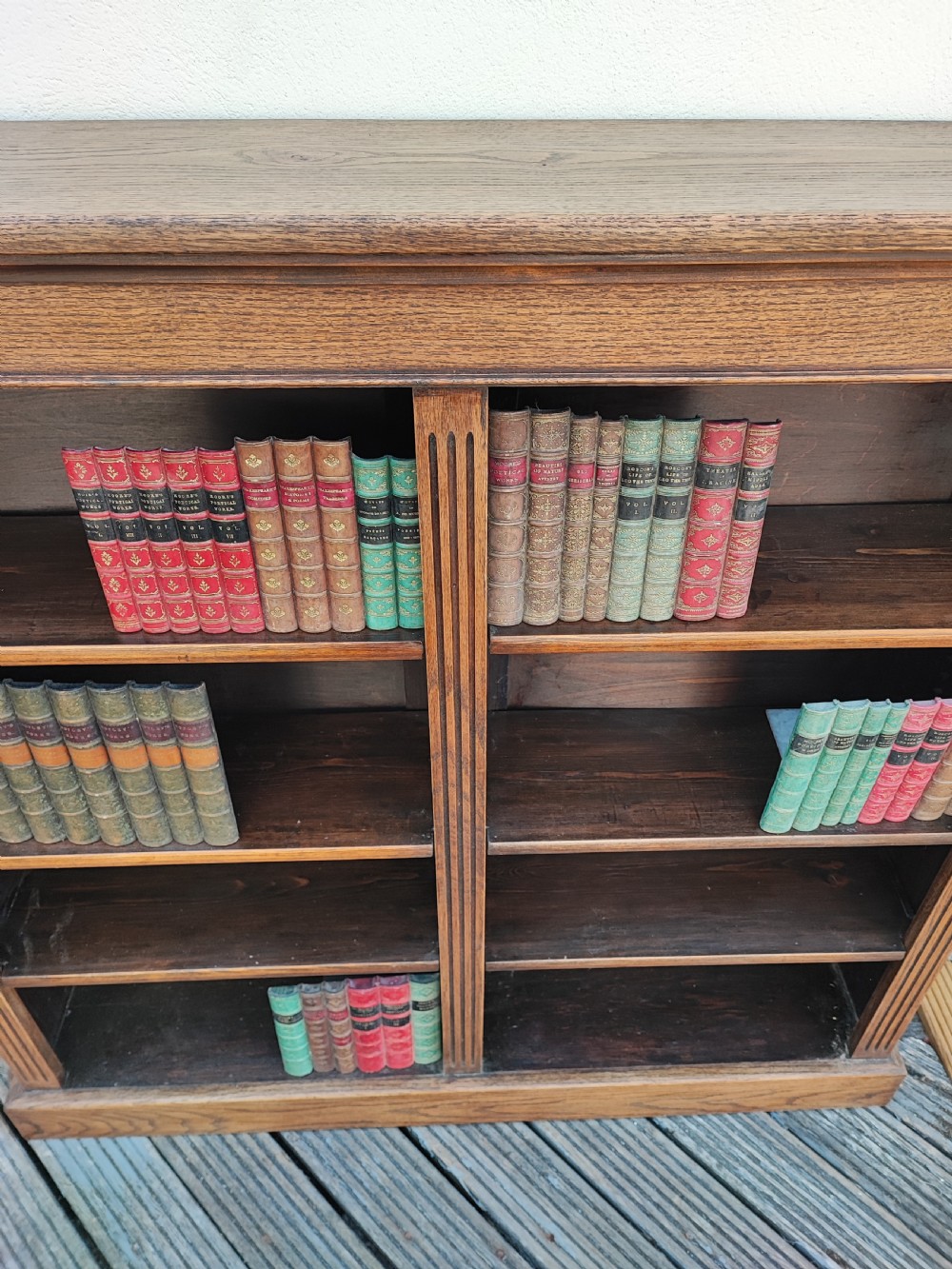 A fine Edwardian oak open bookcase. View IV