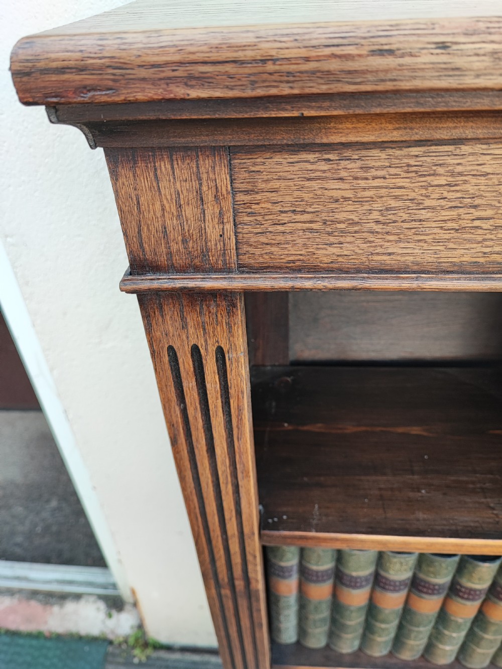 A fine Edwardian oak open bookcase. View VIII