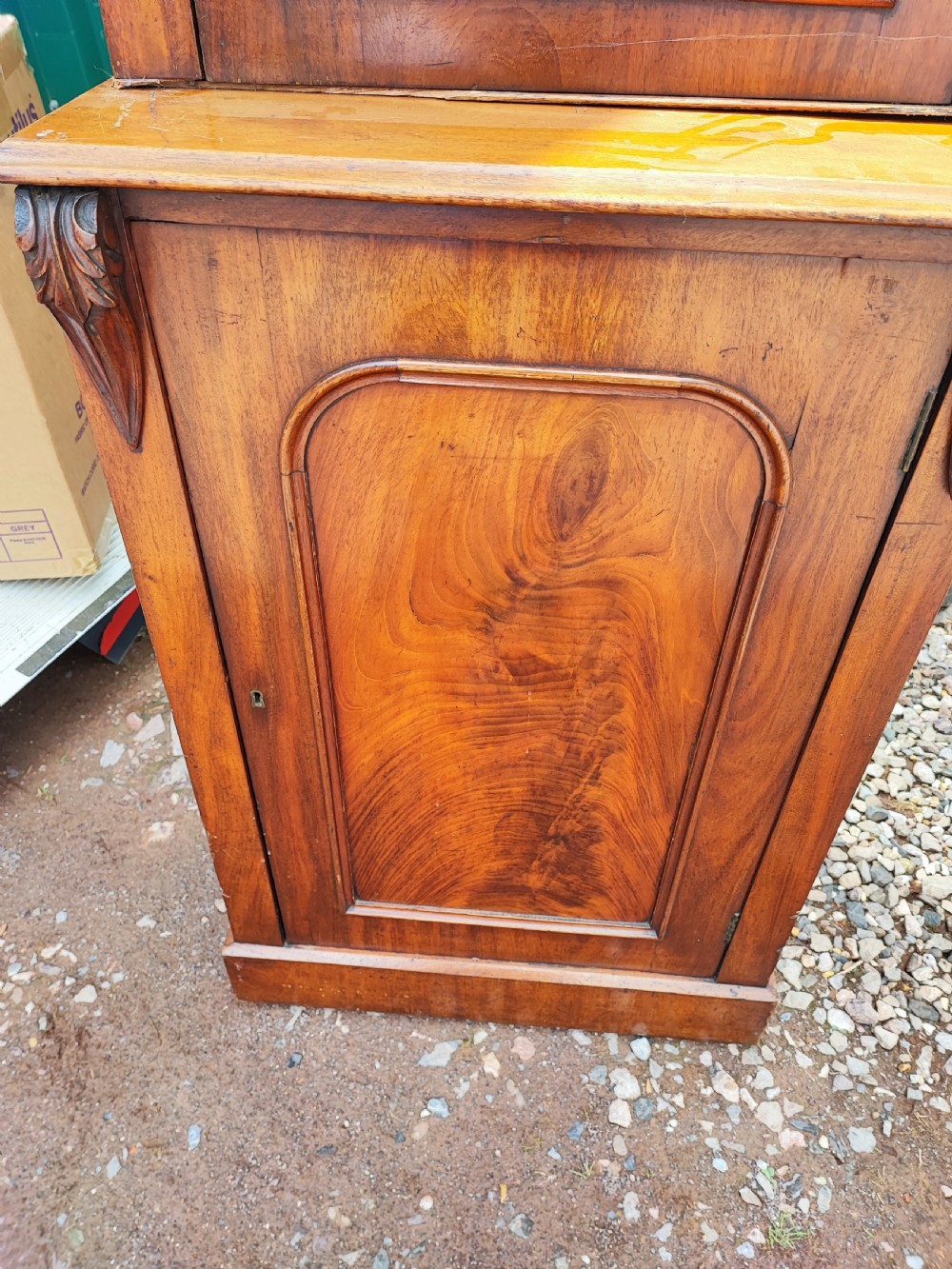 Unusual narrow Victorian mahogany bookcase. View II