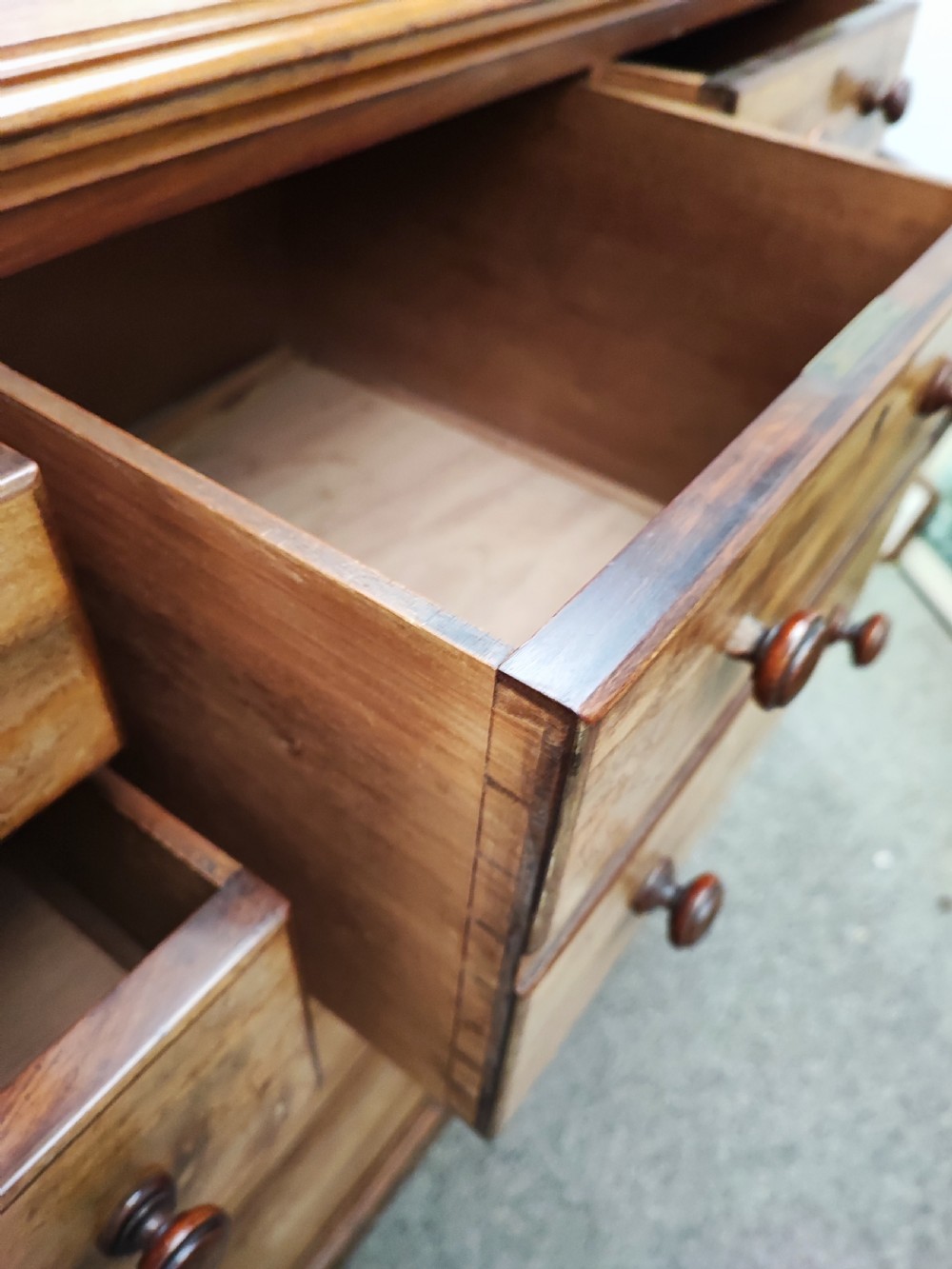 A large and unusual Victorian mahogany chest of drawers. View IV
