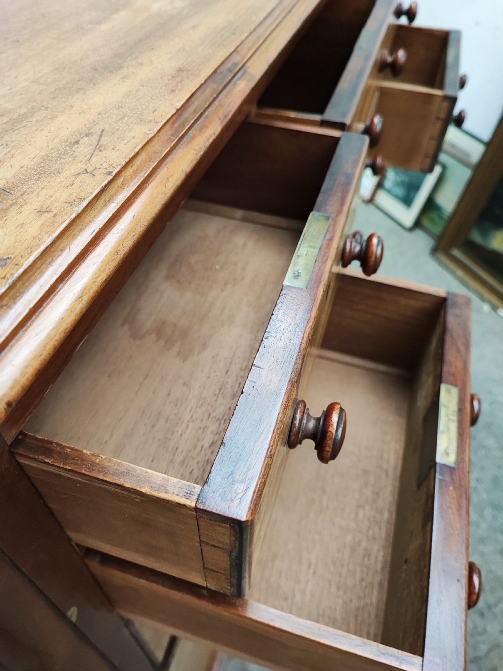 A large and unusual Victorian mahogany chest of drawers. View V