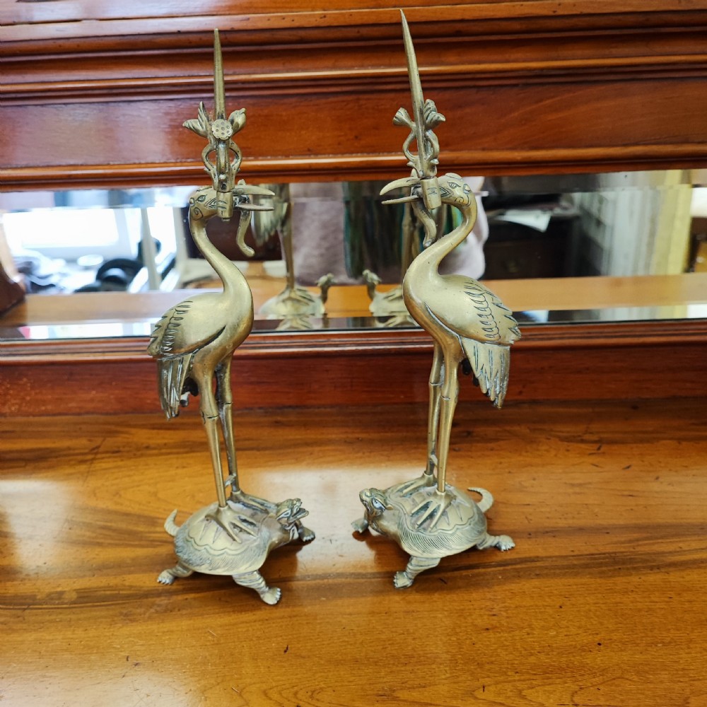 Antique pair of Chinese brass candle sticks  View II