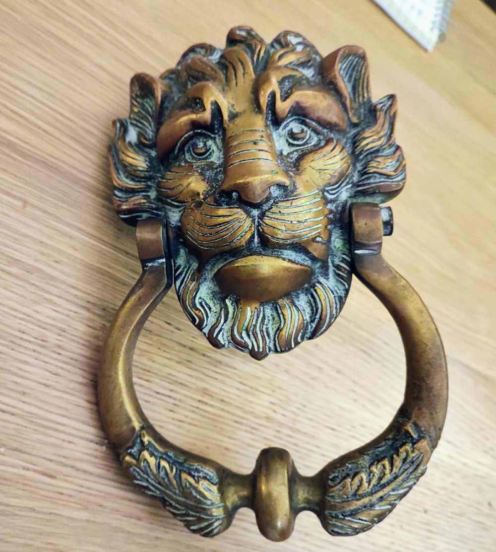 Superb and large antique brass door knocker 