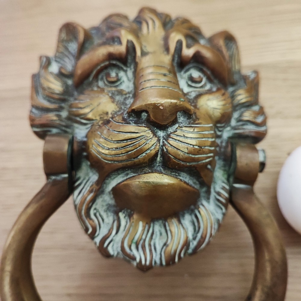 Superb and large antique brass door knocker  View III
