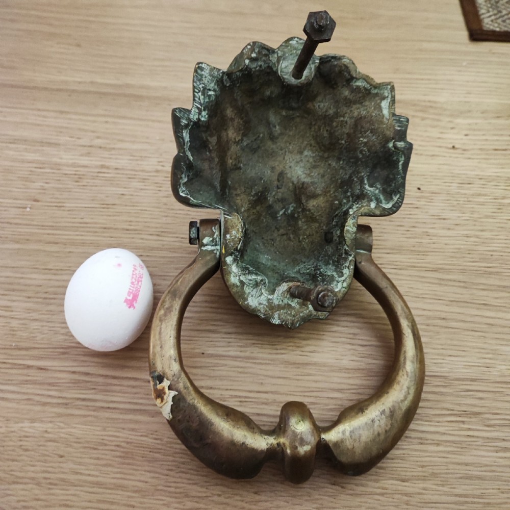 Superb and large antique brass door knocker  View VI