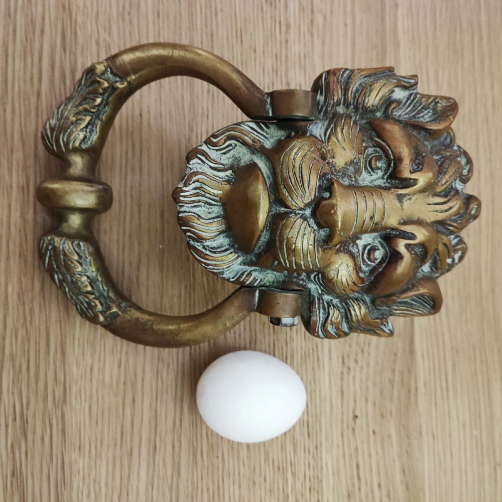 Superb and large antique brass door knocker  View IX