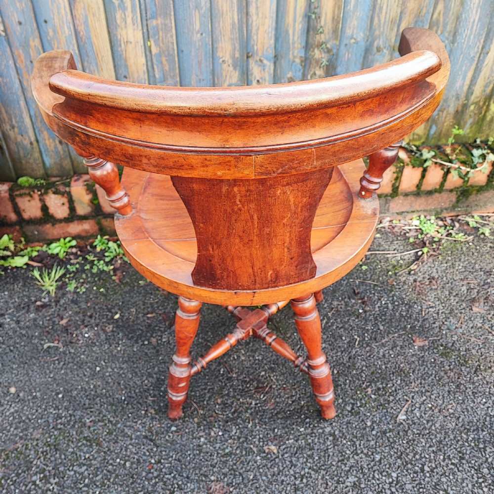 Superb Antique walnut revolving captains desk chair View III