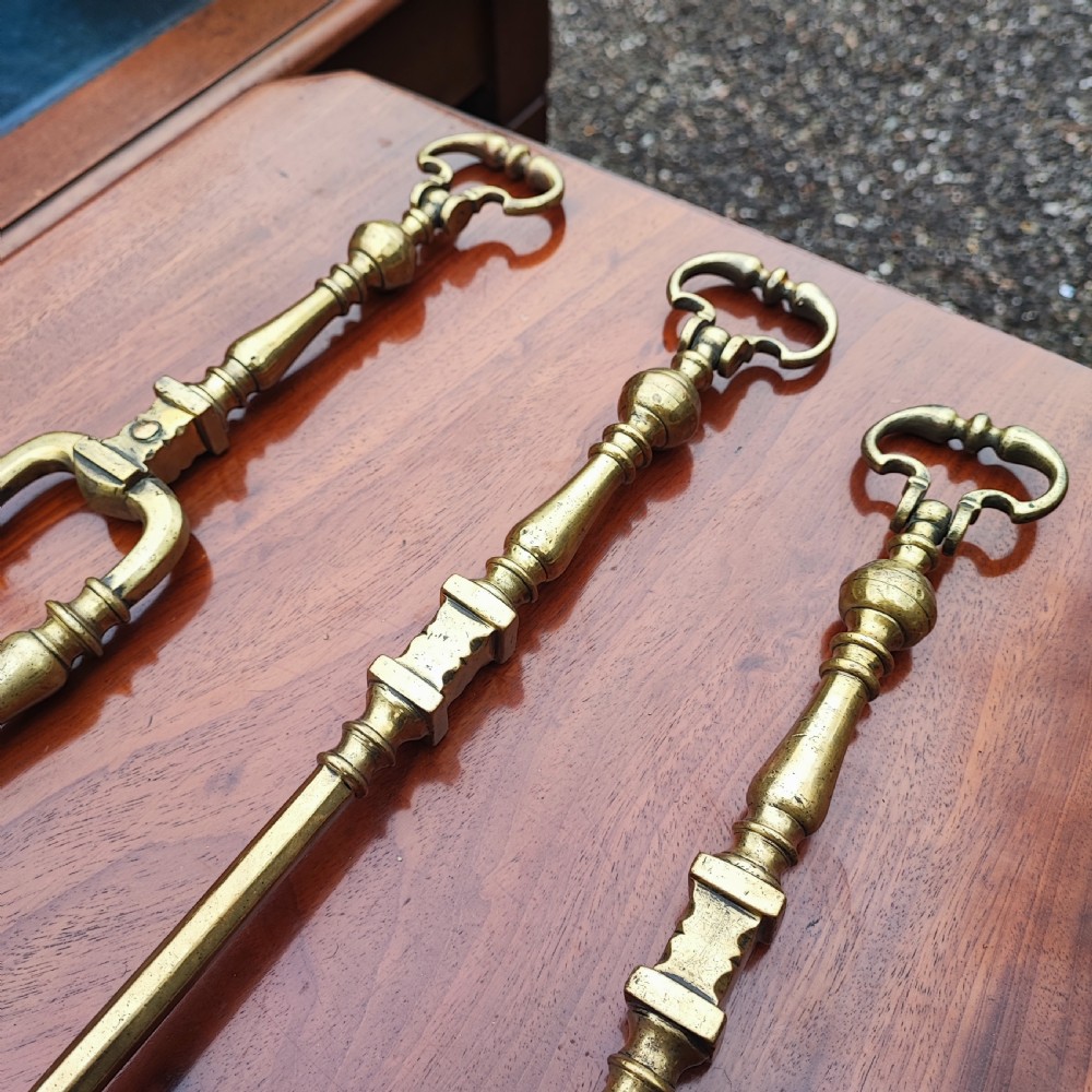 Superb set of brass fire irons View VII