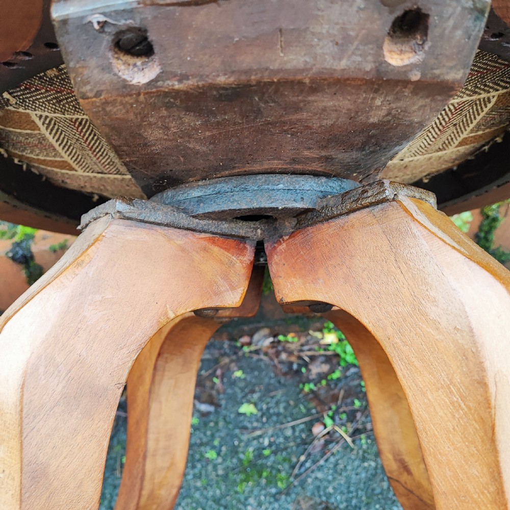 A Victorian mahogany revolving desk chair featuring a curved horseshoe armrest, a pierced central back splat, and an upholstered circular seat. View IV