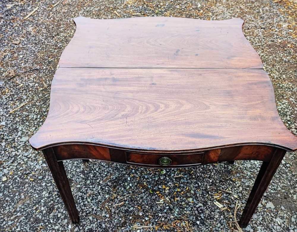 Fine Georgian serpentine mahogany tea table  View IV