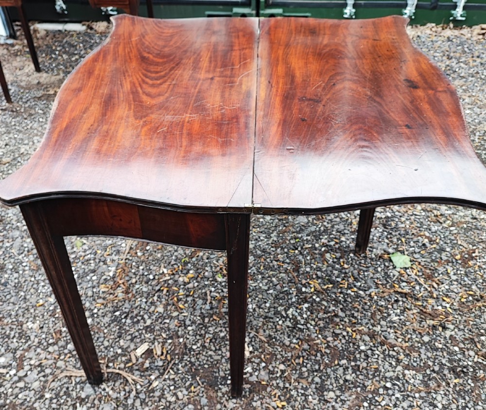 Fine Georgian serpentine mahogany tea table  View V