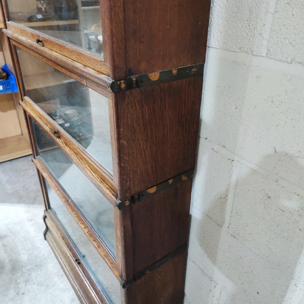 A globe wernick four sectional oak  book case  View V