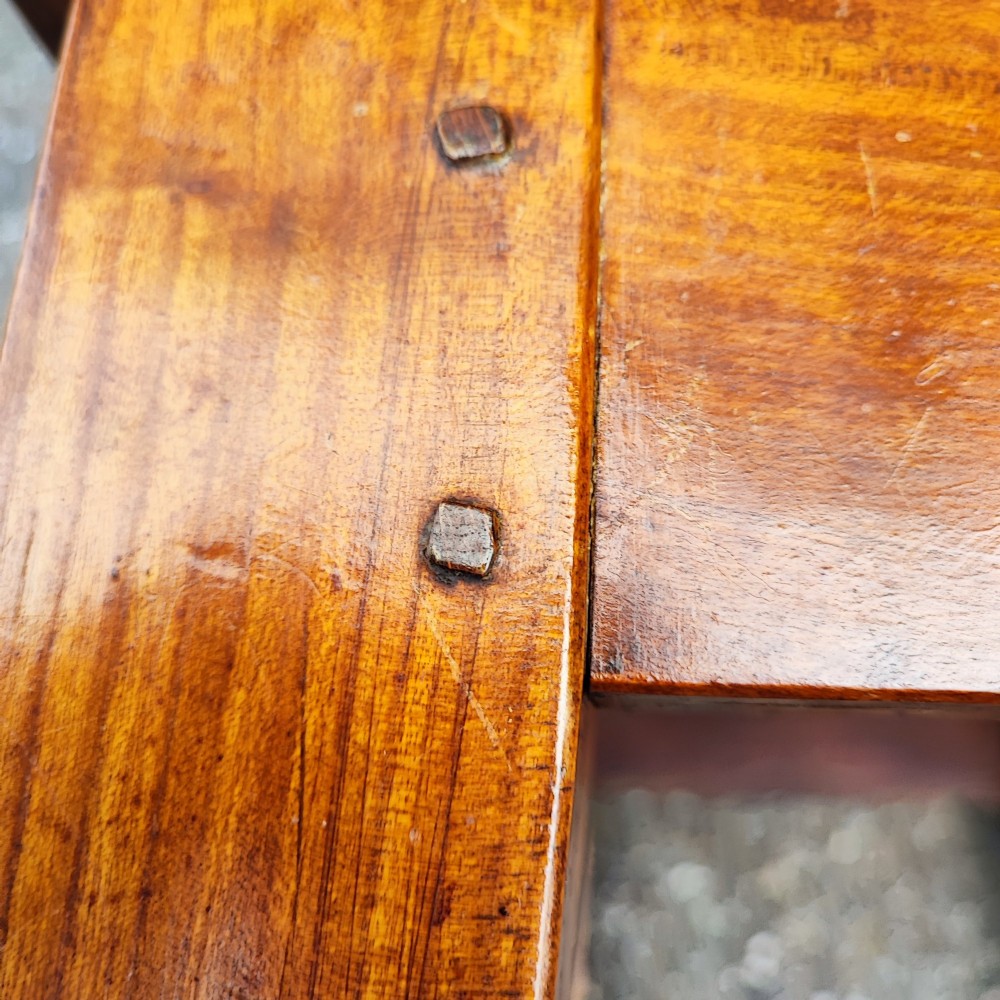 An antique French cherrywood rectangular coffee table with a warm golden-amber surface and square straight legs. View IX