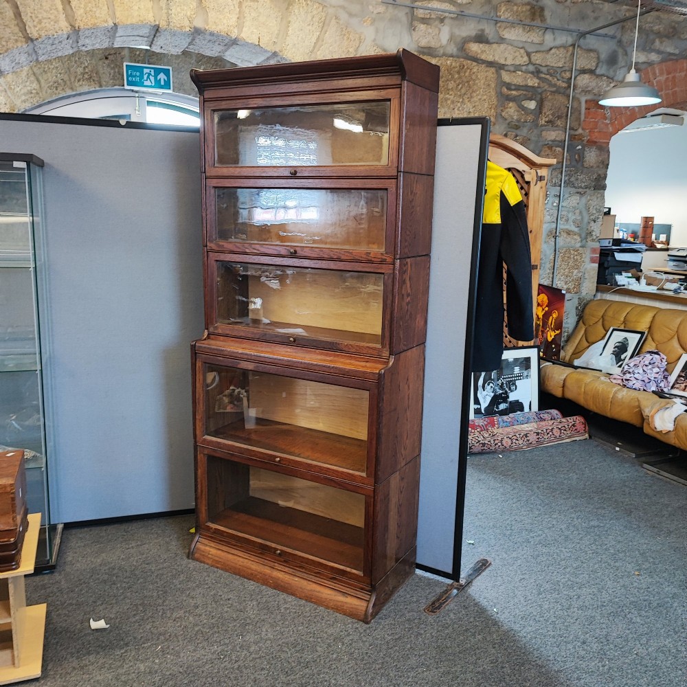 A five tier sectional solicitors book case  in oak