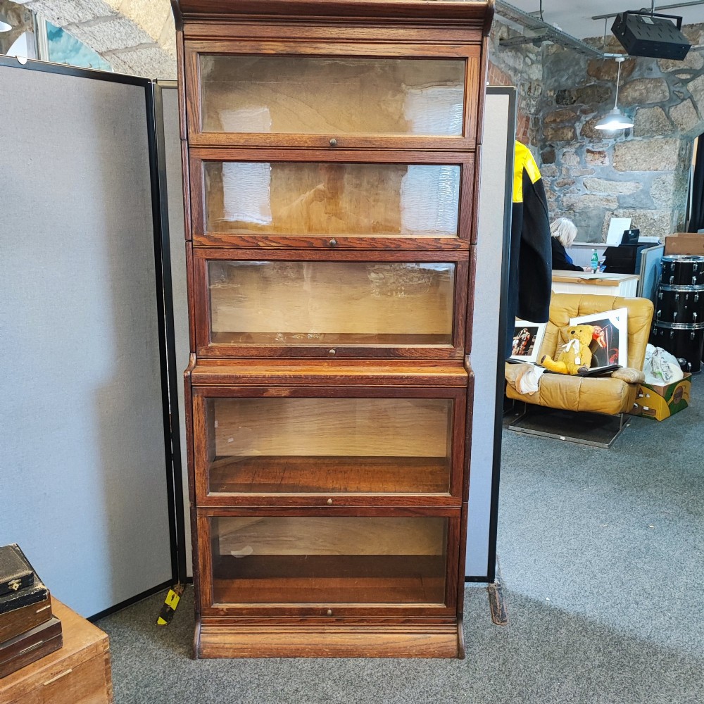 A five tier sectional solicitors book case  in oak View IV