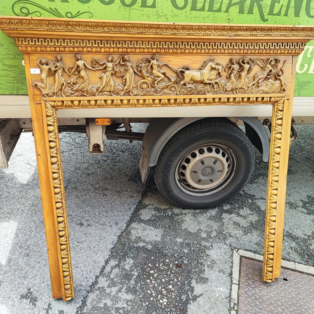 Edwardian pine and carved fire surround