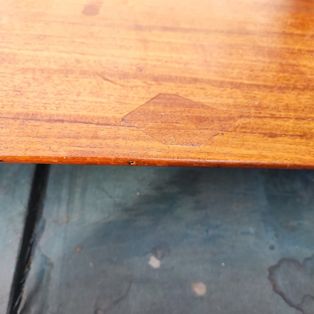 A Georgian mahogany side table with square tapered legs and an open single drawer featuring green lining paper and turned wooden knobs. View III