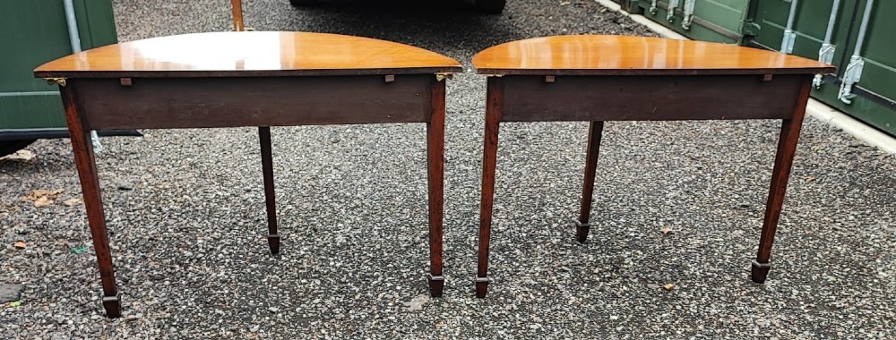 A pair of Georgian demi lune mahogany console tables View II
