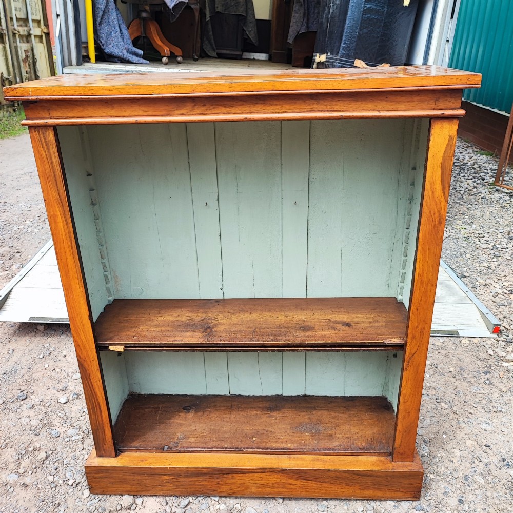 A Victorian walnut open bookcase