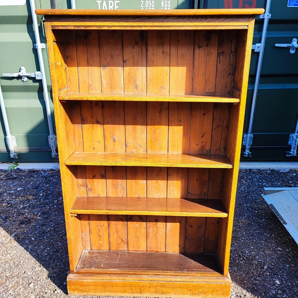 Antique  golden oak arts and crafts open bookcase with copper side panels