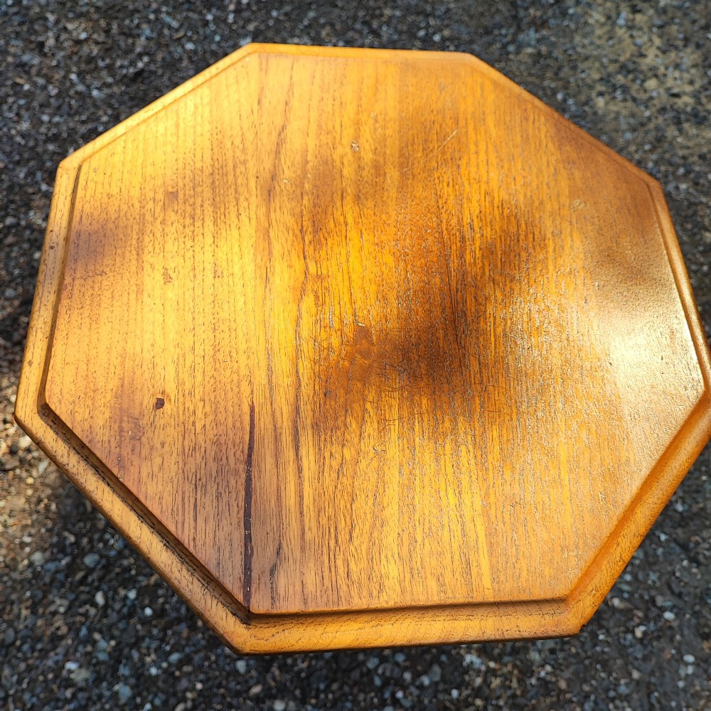 A Victorian walnut trumpet work box featuring an octagonal hinged top, tapering conical body, and carved tripod cabriole legs. View IV