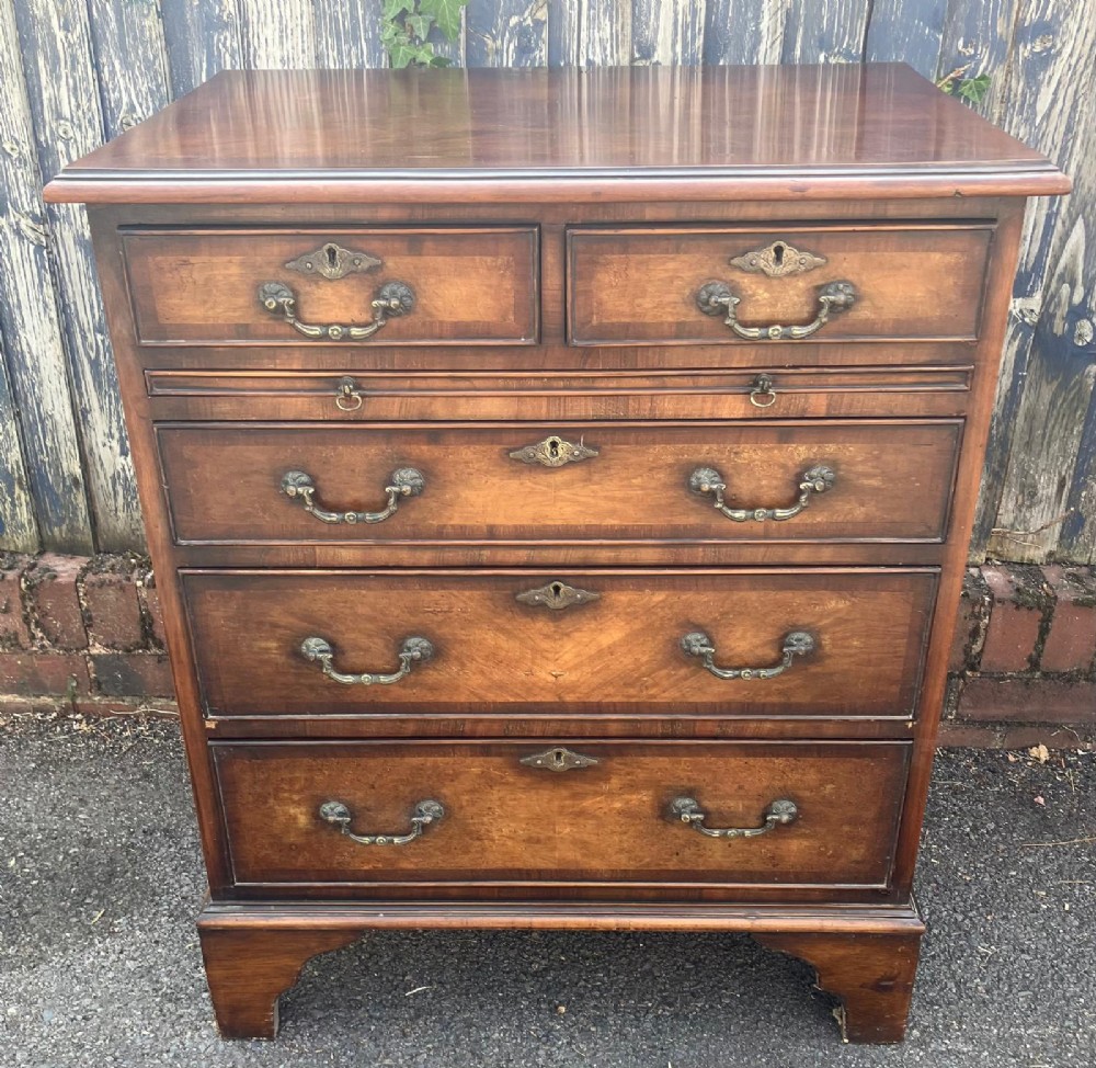 Good antique walnut and mahogany small chest of drawers