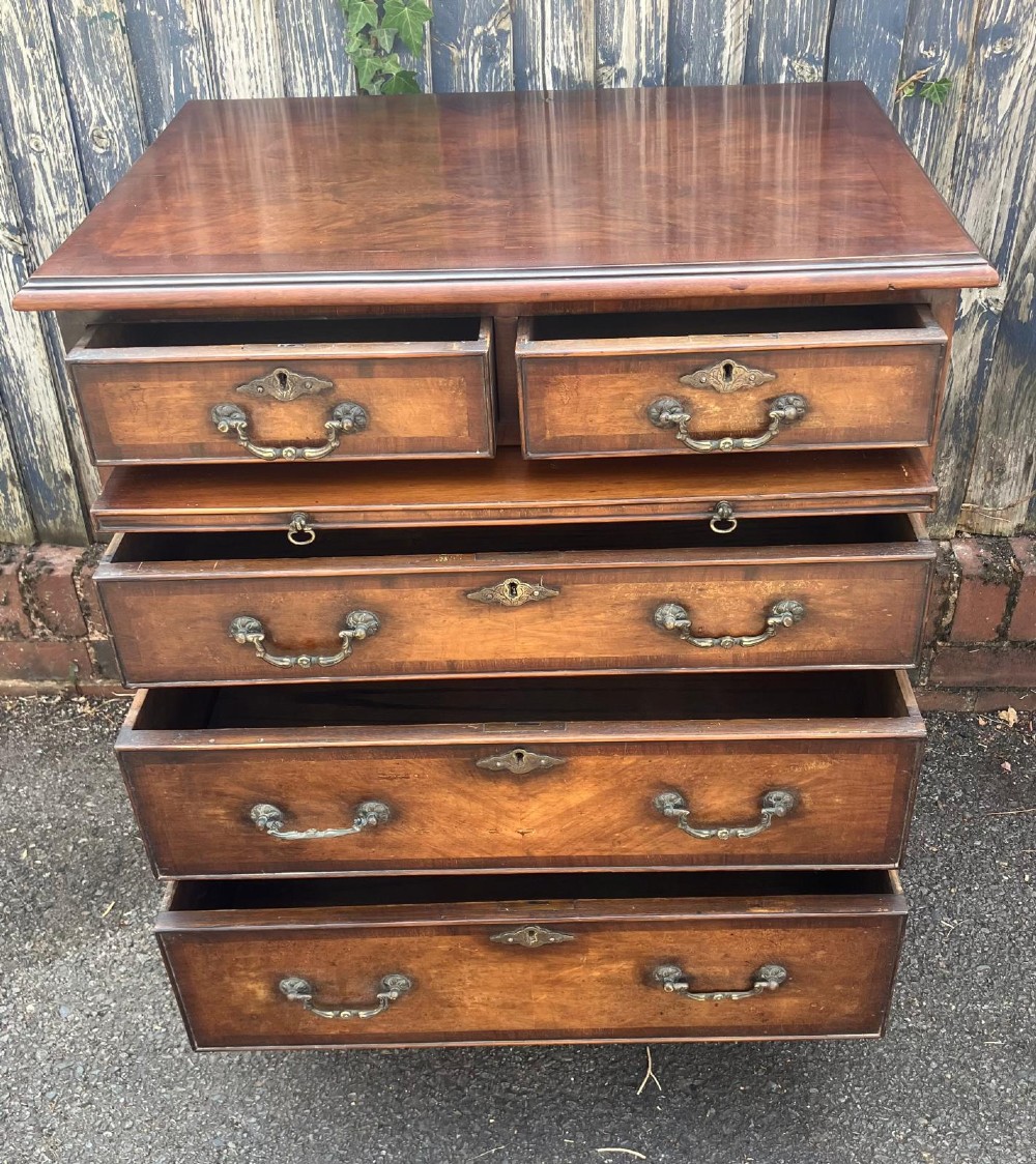 Good antique walnut and mahogany small chest of drawers View II