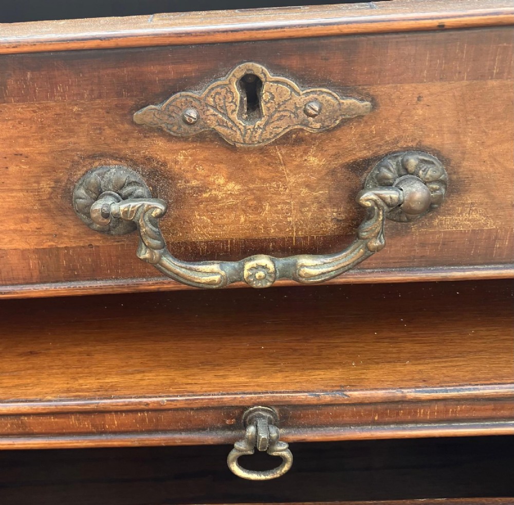 Good antique walnut and mahogany small chest of drawers View V