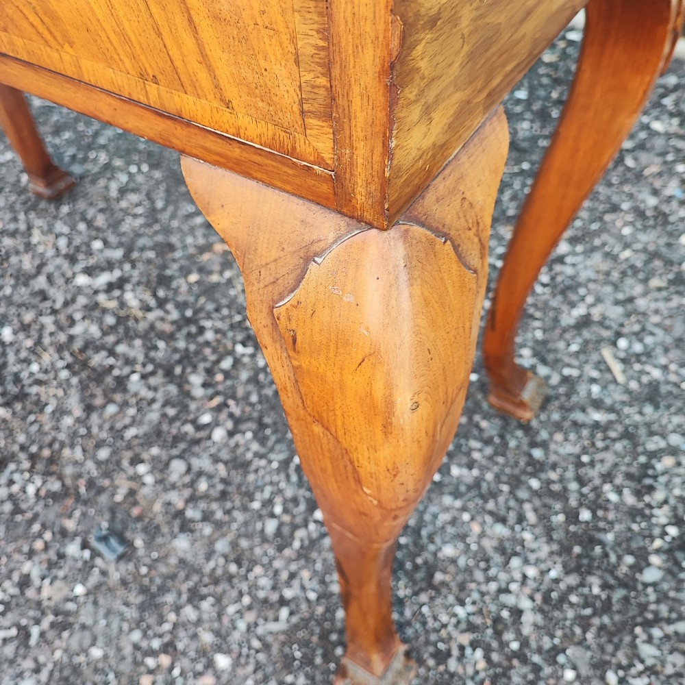 An antique walnut side serving table with two drawers, brass drop handles, cabriole legs, and a shaped decorative gallery back. View II