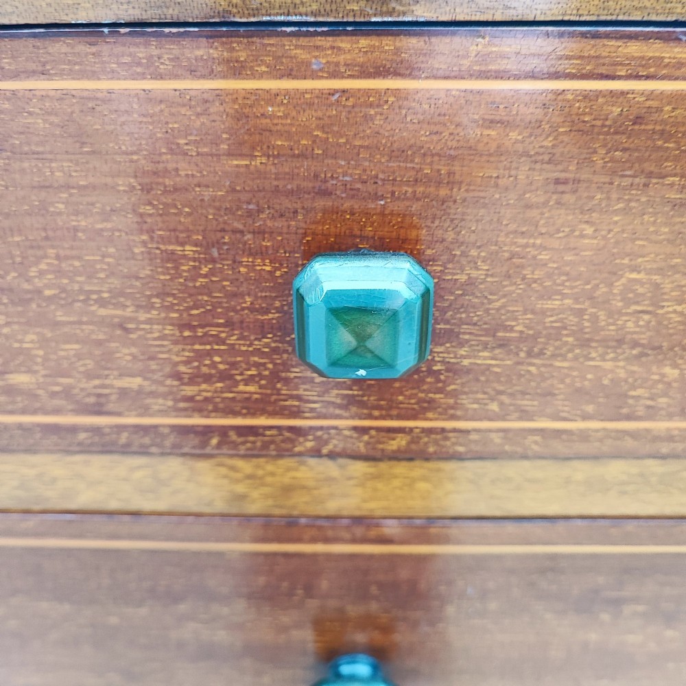 A five-drawer mahogany chest of drawers featuring boxwood line inlay, square handles, and a raised top gallery with an inlaid marquetry panel. View II