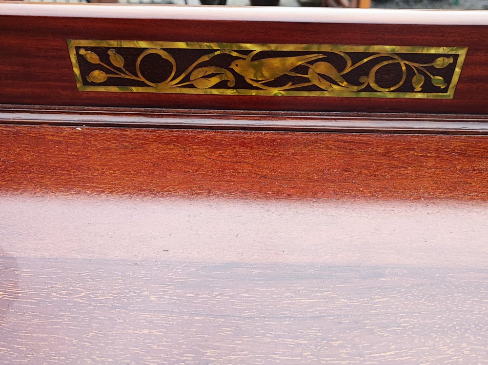 A five-drawer mahogany chest of drawers featuring boxwood line inlay, square handles, and a raised top gallery with an inlaid marquetry panel. View III